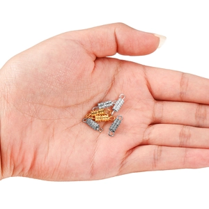 Threaded cylinder jewelry clasps in gold and silver held in palm for size comparison