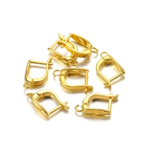 Close-up of golden leverback earring hooks for DIY jewelry making and craft supplies