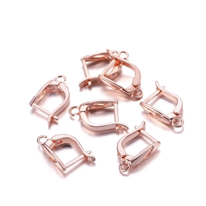 Close-up of rose gold lever back earring hooks with attachment loops for DIY jewelry