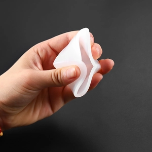 Flexible cube silicone resin mold being squeezed to show high elasticity and durability