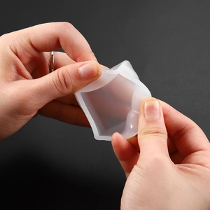 Close-up showing the flexible texture and high elasticity of cube silicone resin mold