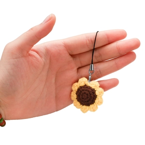 Handmade crochet sunflower pendant with lobster clasp and black nylon cord attachment