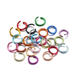 Mix of colorful aluminum jump rings for DIY jewelry making in various vibrant metallic shades
