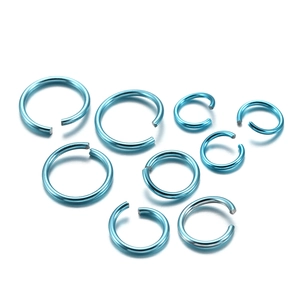 Set of 8 light blue open jump rings in various sizes for DIY jewelry and piercings