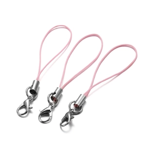 Close-up of pink nylon mobile phone straps with durable silver lobster clasps for DIY crafts