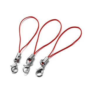 Close-up of three red nylon lanyards with silver metal lobster clasps and cord ends