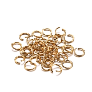 Macro view of golden open jump rings for DIY jewelry making and bracelet connections