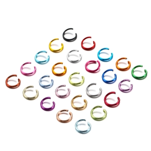 Colorful aluminum open jump rings in various vibrant metallic finishes for DIY jewelry making