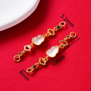 Detail of vintage gold gourd pendant with white jade inlay and size measurements