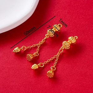 Close-up of golden lotus flower earrings with dimensions 50mm length and 7.5mm width