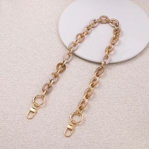 Detail of 62cm acrylic bag strap with marble texture links and gold metal lobster clasps