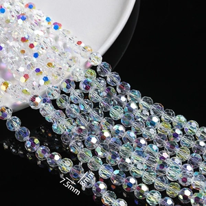 Detail of 7.5mm and 8mm faceted crystal glass beads with iridescent AB coating for DIY