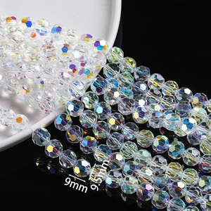 Detail of 9mm and 9.5mm faceted AB crystal glass beads for DIY jewelry making