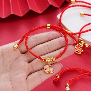 Red braided 2026 Chinese New Year bracelet with pink rocking horse and gold beads