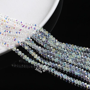 Macro shot of 3mm and 4mm iridescent AB coated faceted glass crystal beads for DIY jewelry