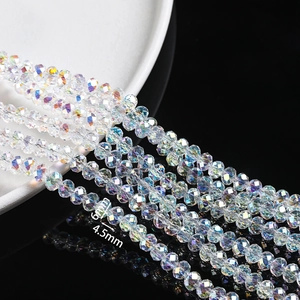 Macro shot of 4.5mm and 6mm faceted crystal glass beads with AB coating for DIY jewelry