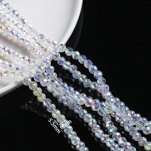 Detailed macro view of 5.5mm and 6mm AB coated faceted glass crystal beads for DIY jewelry