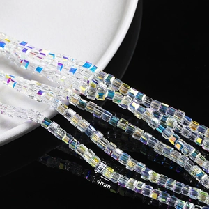 Macro detail of 4mm square crystal beads with AB rainbow coating for DIY jewelry