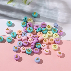 Flat round acrylic alphabet beads with gold lettering for DIY jewelry making