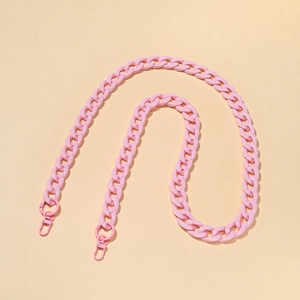 Close-up of matte pink acrylic chunky chain strap with matching lobster clasps
