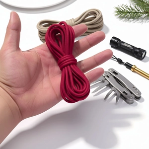 Detailed texture of 5mm braided paracord in dark red and khaki for DIY crafting projects