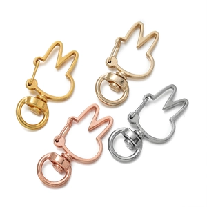 Detailed view of miffy-shaped alloy swivel clasps in gold, silver, and rose gold finishes