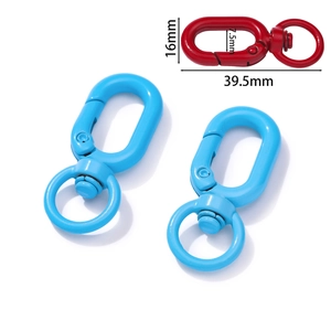 Detail view of 39.5mm alloy lobster clasps in sky blue and red with paint finish
