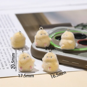 Detailed view of yellow flocked chick pendants showing dimensions and soft fuzzy texture