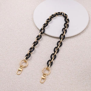 Black acrylic and gold metal link bag strap with round lobster clasps for handbags