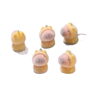 Set of five cute plush animal keychain pendants in yellow and pink with metal rings