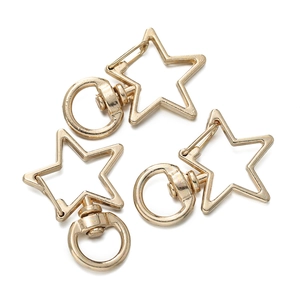Three gold star-shaped lobster clasps with 360-degree rotating rings for DIY keychains