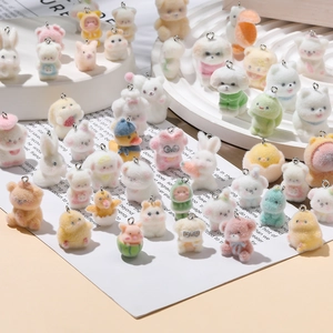 Charming flocked animal pendants including bear, dog, and duck with metal keyrings