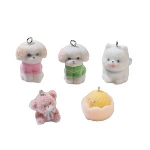 Five assorted cute flocked animal charms including puppies and bear with metal rings
