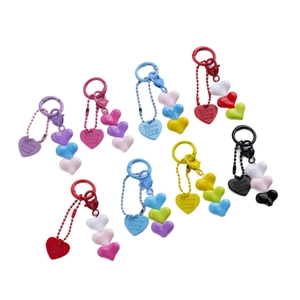 Colorful resin heart beaded keychain set in eight vibrant gradient color options