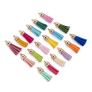 Detailed view of 18 colorful 3.8cm CCB plastic mini tassels with gold caps for DIY crafts