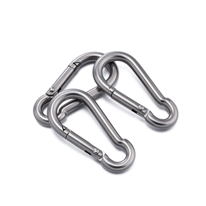 Close-up of three durable 304 stainless steel spring snap hooks with brushed metal finish