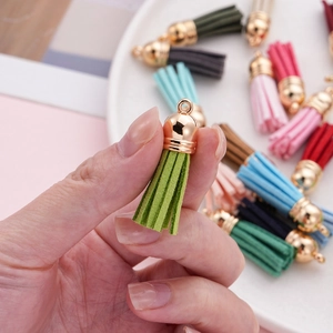 Macro shot of 3.8cm colorful CCB plastic tassel with gold cap for DIY earring making