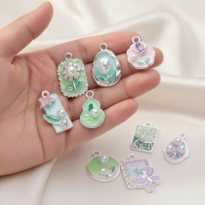 Silver alloy charms set with enamel coating and faux pearls for DIY jewelry making