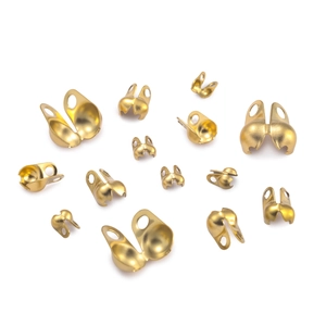 Detail of matte gold stainless steel calotte ends in various sizes for DIY jewelry
