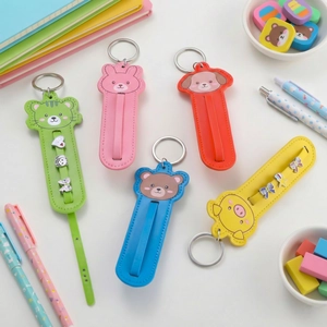 Set of five cute cartoon animal leather keychains with pull-strap design and metal rings
