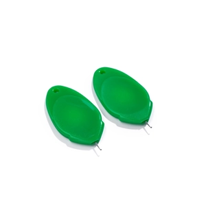 Close-up of green leaf-shaped needle threaders with fine metal hooks on a white background