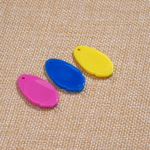 Three-piece colorful needle threader set for sewing with metal loops on textured fabric