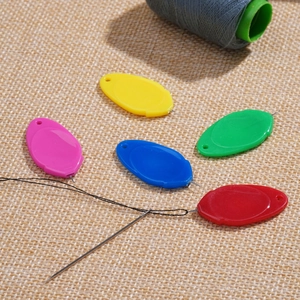 Five colorful acrylic needle threaders with stainless steel loops for DIY sewing work