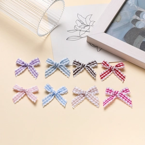 Set of 8 colorful striped bow knots for DIY crafts and hair accessories decoration