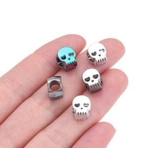 Macro shot of skull beads with heart-shaped eyes for DIY bracelet and jewelry making