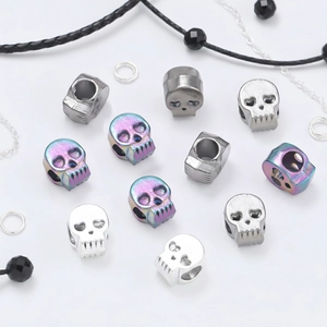 Macro view of colorful alloy skull beads with large holes for DIY jewelry making