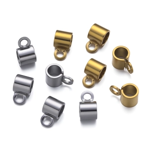 Detailed view of polished gold and silver stainless steel end caps for jewelry making