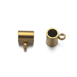 Close-up of golden stainless steel cylinder beads for DIY jewelry bracelet making