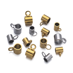 Close-up of stainless steel bead connectors in gold and silver for DIY jewelry making