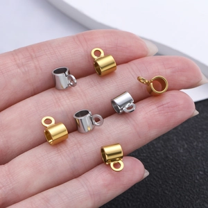 Stainless steel cylinder jewelry end caps with loops in gold and silver finishes